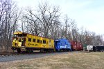 The Chessie System and Conrail Caboose trail on the TFT train just north of the Boyd St Grade Crossing